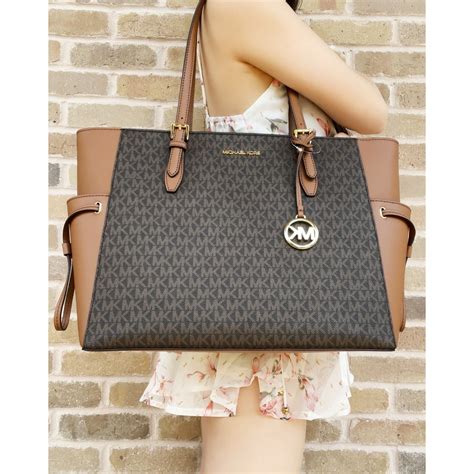 michael kors brown bag with mk qith draw strinf|Michael Kors Brown Outlet Handbags.